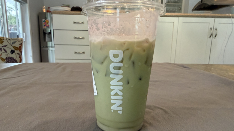 Dunkin' Barbie Strawberry Cloud Matcha on grey tablecloth