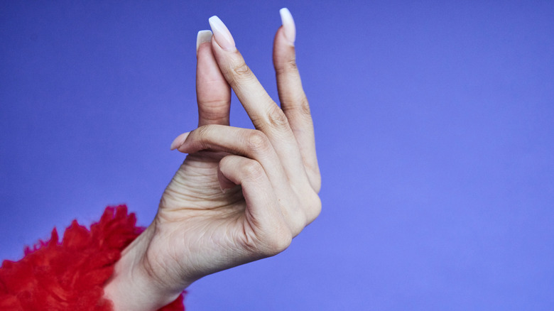 woman snapping fingers