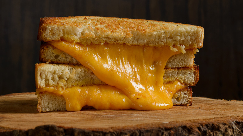 Oozing sliced grilled cheese sandwich