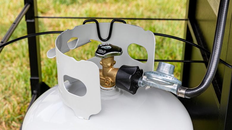 A propane tank connection that has been thoroughly cleaned