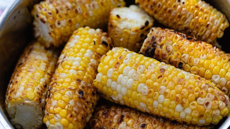 Close-up of grilled sweet corn on the cob.