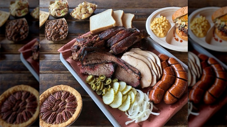 Plate of Little Miss BBQ brisket, other meats, and sides