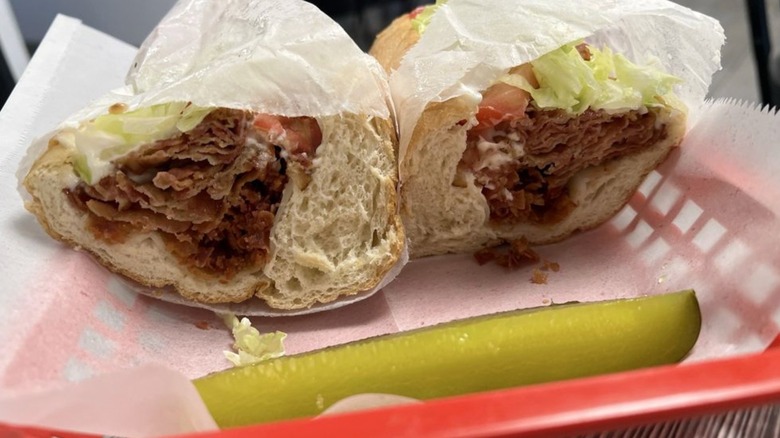 Frank's New York Style Deli Classic BLT in a basket with a pickle