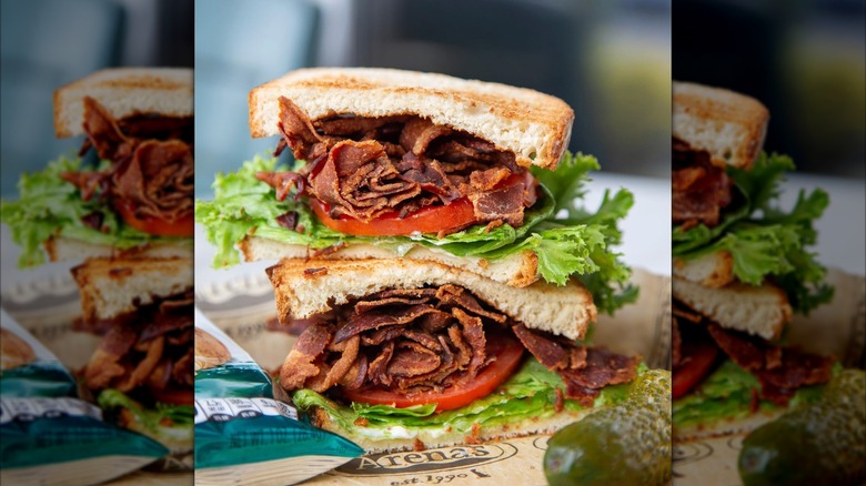Arena's The Stacked BLT with pickle and chips