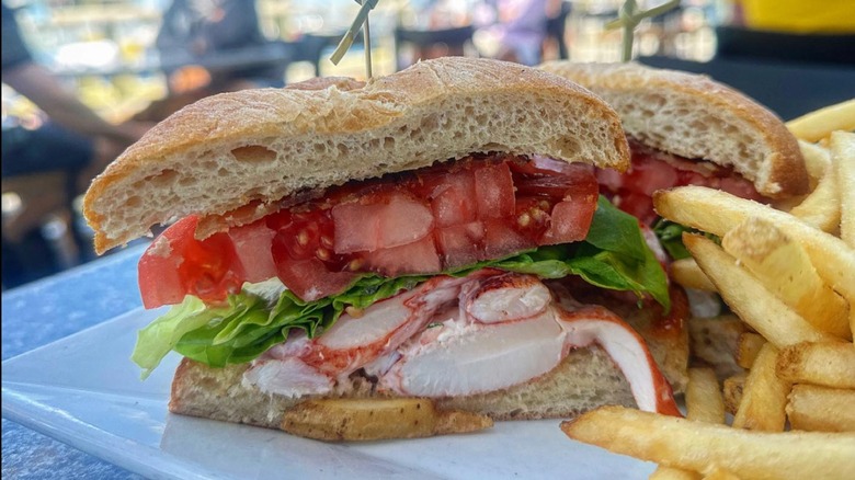 Peter Ott's on the Water Lobster BLT with fries on a white plate