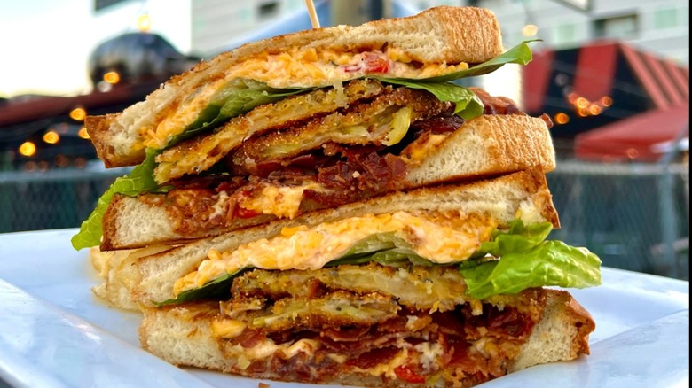 Lunch.SUPPER! Fried Green Tomato BLT on a white plate