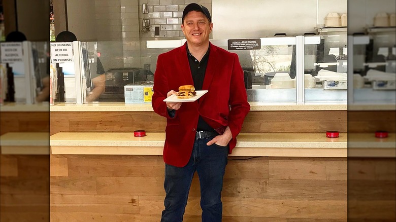 NFA founder Billy Kramer with burger in hand