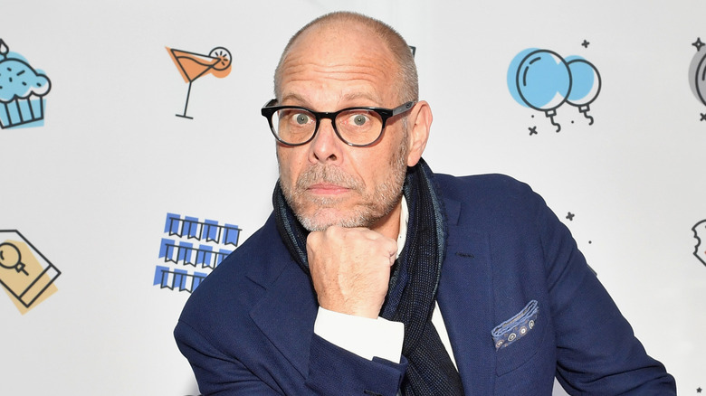 Alton Brown poses with chin on fist