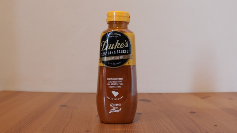 Duke's Carolina Gold BBQ Sauce on a wooden table