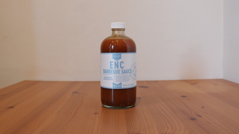 Lillie Q's ENC Barbecue Sauce on a wooden table