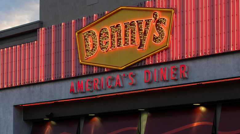 Denny's sign on Las Vegas strip with neon restaurant logo