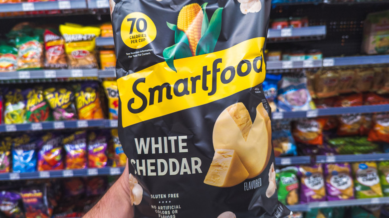 smartfood package in hand