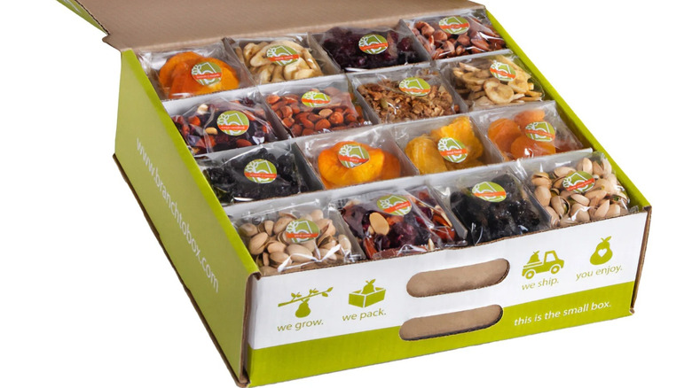 a box of dried fruit and nuts arranged in 4 rows and 4 columns