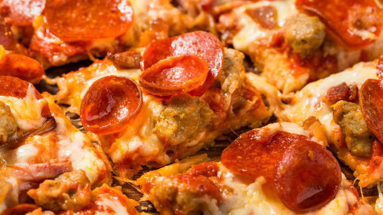 Square cut pizza with pepperoni and sausage