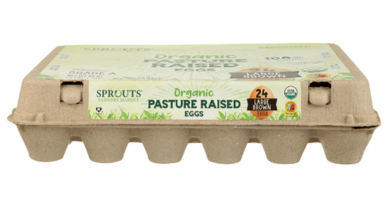 Carton of Sprouts Organic eggs on a white background