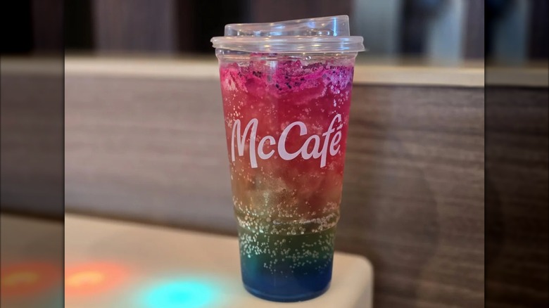 Rainbow Redbull Dragonberry Energizer from McDonald's on a tabletop