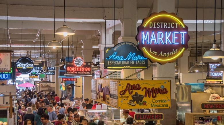 Grand Central Market in Downtown Los Angeles loaded with people looking for food at lunchtime.