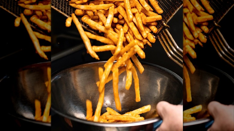 French Fries being shaken out of a fryer into a pan from Burgers by Wildwich
