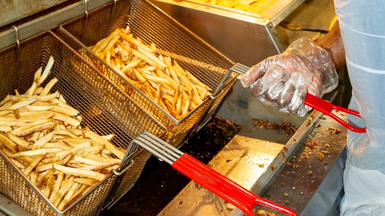 French fries being made in the deep fryer at Stamps Super Burgers