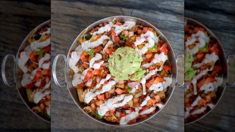 View from above of loaded fries from 595 Craft And Kitchen