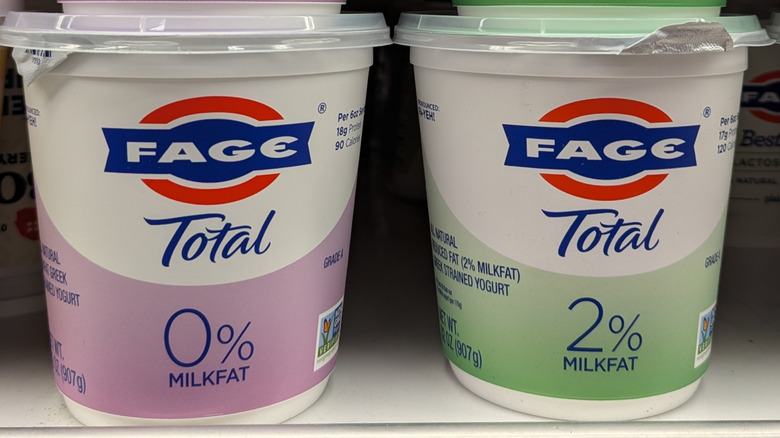 Tubs of Fage yogurt on grocery store shelf