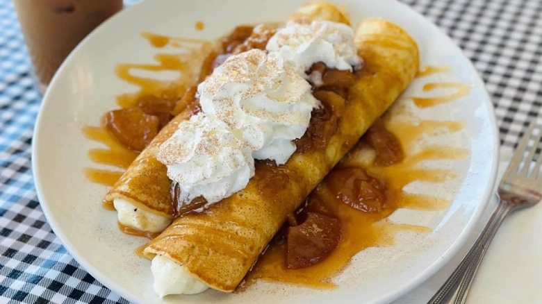 Apple crepes drizzled wih sauce and whipped cream at Jimmy's Down the Street restaurant