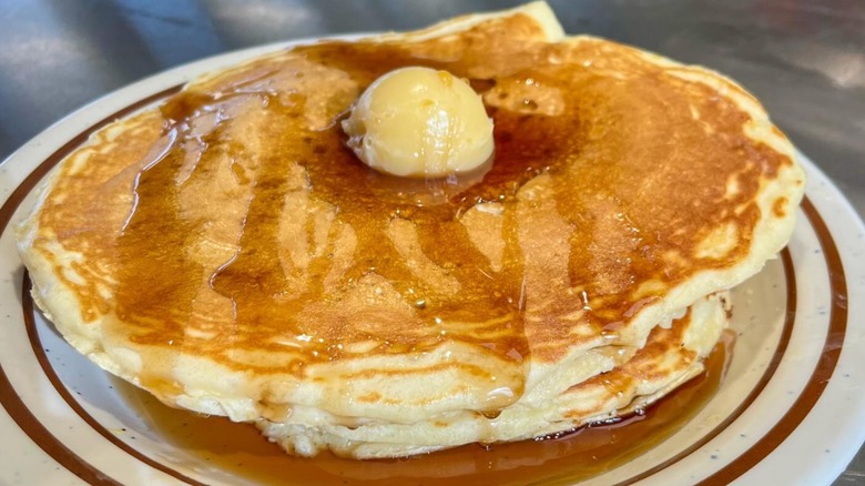 Pancakes with syrup and butter at OK Diner