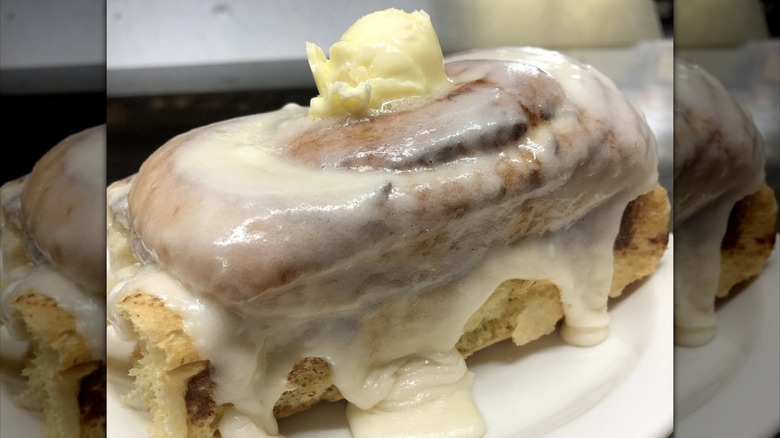 Homemade cinnamon roll topped with butter at The Chef's Hut restaurant
