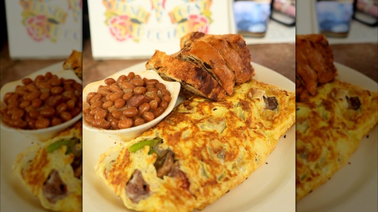Philly cheesesteak omelette with side of beans and cinnamon raisin toast at Miss Worcester Diner