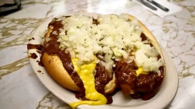Coney dog piled high with toppings at Duly's Place Coney Island