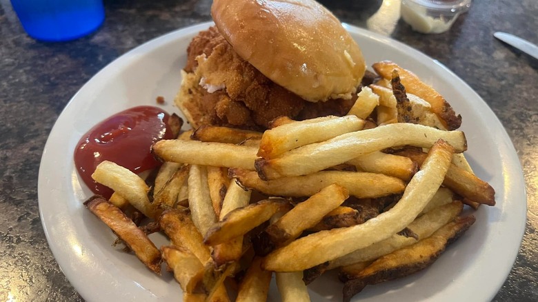 Pork Tenderloin Sandwich with French Fries at Home Town Diner