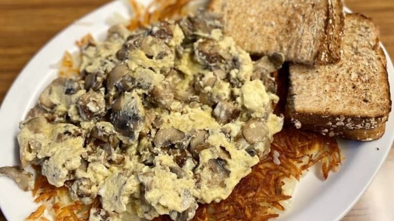Omelet with mushroom and side of wheat toast at Voula's Offshore Cafe