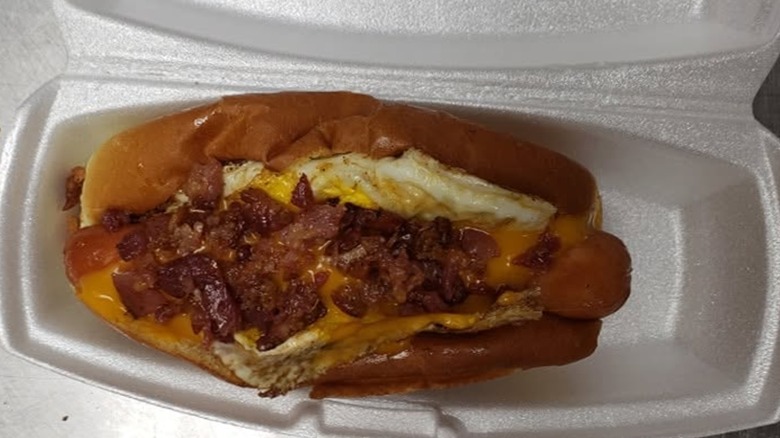 Breakfast Dog with Egg, Nacho Cheese and Bacon on toasted bun at The Root Beer Shack