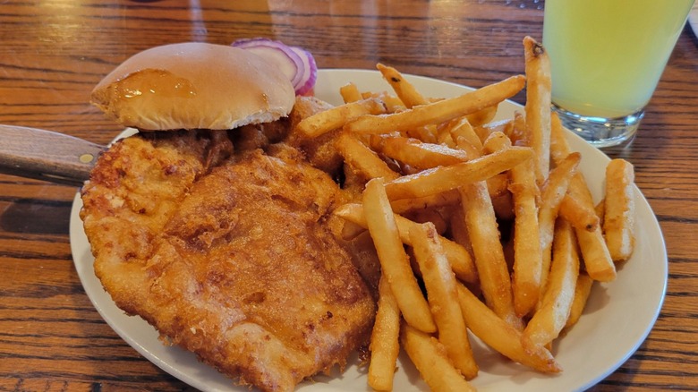 Breitbach's Country Dining Pork Tenderloin Sandwich with side of fries