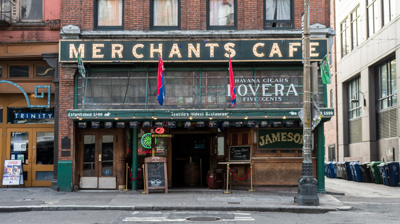 merchant's cafe sign on brick building
