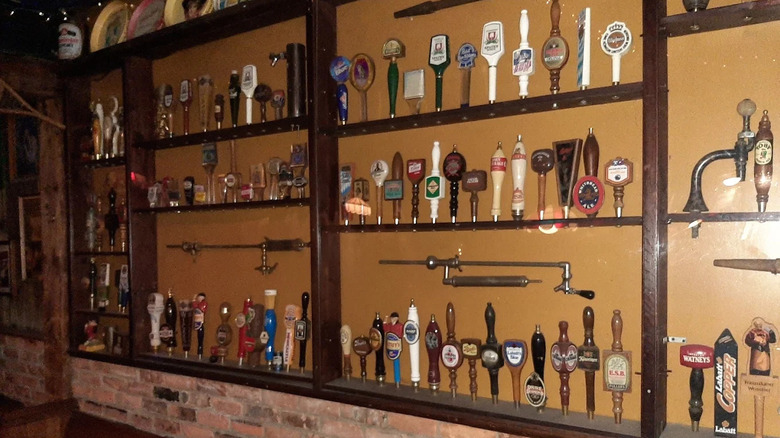 vintage beer taps on shelf