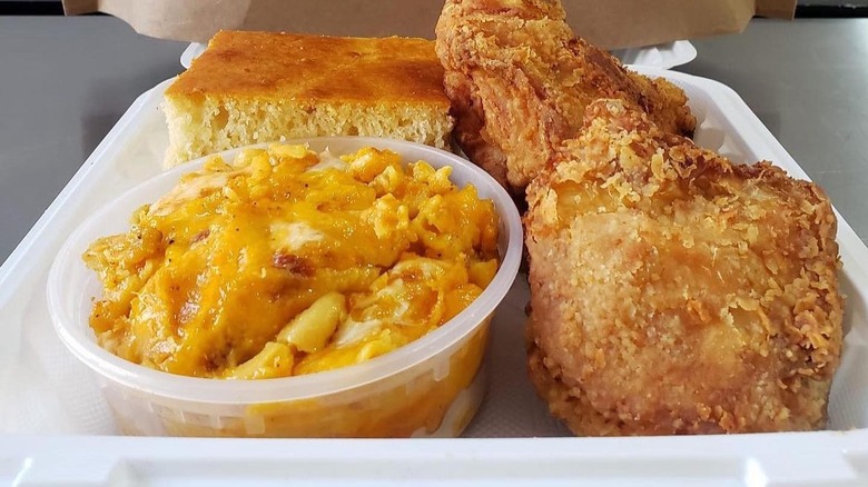 Corn bread, macaroni an cheese, and fried chicken