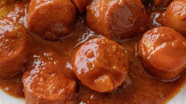 sliced sausage in currywurst sauce