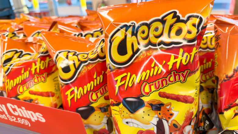 Bags of Hot Cheetos on a store shelf