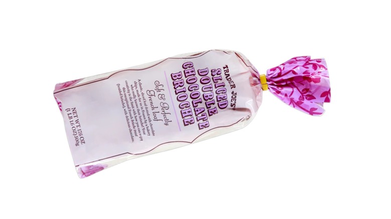 A bread bag labelled Trader Joe's Sliced Double Chocolate Brioche with pink details on a white background.