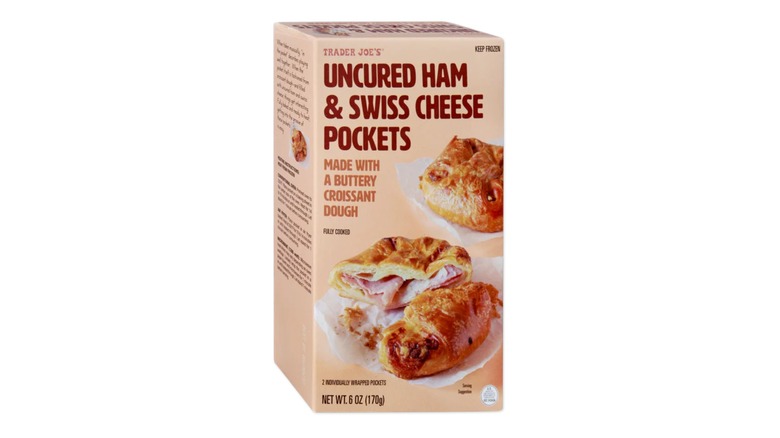A package of Trader Joe's Uncured Ham & Swiss Cheese Pockets on a white background.