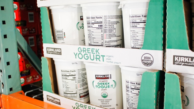 A view of several large containers of Kirkland Signature Greek yogurt, on display at a local Costco.