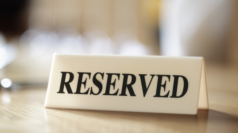 Aa reserved sign on a table