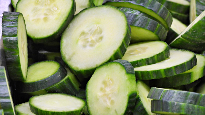 close up of cucumber slices in pile