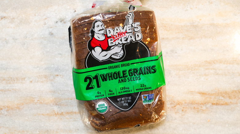 A loaf of Dave's Killer Bread on a counter top