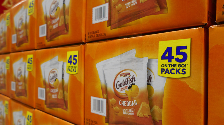A close-up shot of 45-count Goldfish cracker boxes, stacked in a store
