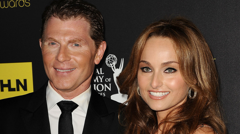 Bobby Flay and Giada DeLaurentiis smiling