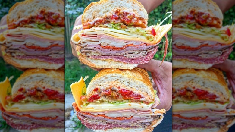 The Bomb sandwich filled with meats and cheeses, sliced open