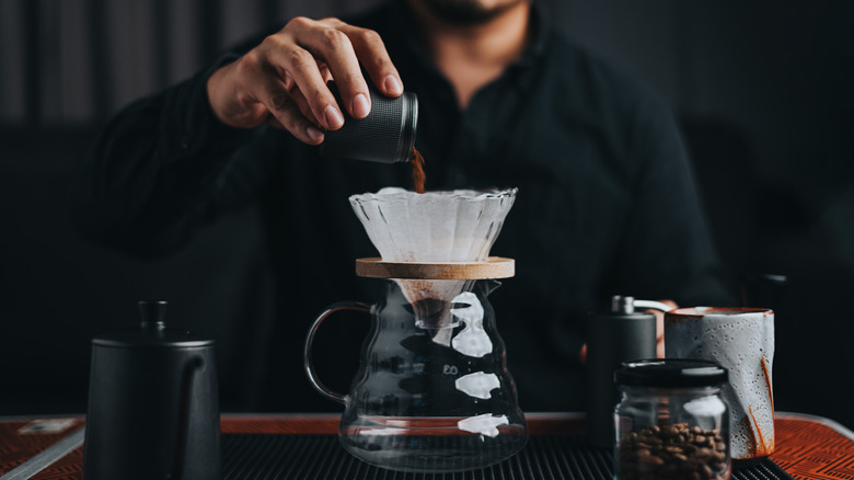 professional barista making coffee