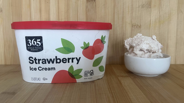 Tub of Whole Foods 365 strawberry ice cream
